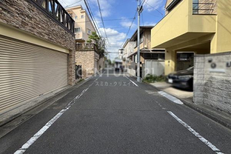 �����s���c�J�扜��2���ڂ̒��È�ˌ��Ă̑O�ʓ��H�܂ތ��n�ʐ^