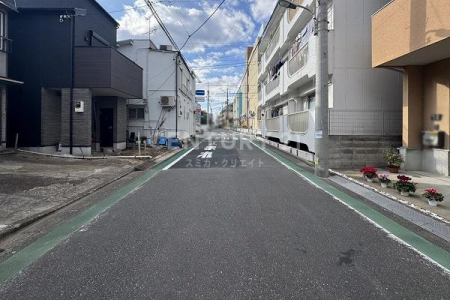 �����s��c���v����2���ڂ̐V�z��ˌ��Ă̑O�ʓ��H�܂ތ��n�ʐ^