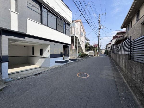 �����s���c�J���1���ڂ̒��È�ˌ��Ă̑O�ʓ��H�܂ތ��n�ʐ^