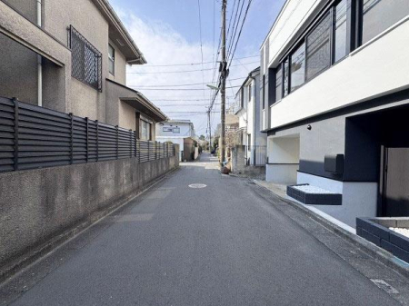 �����s���c�J���1���ڂ̒��È�ˌ��Ă̑O�ʓ��H�܂ތ��n�ʐ^