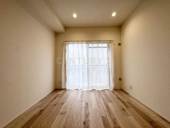 �����s���c�J��{��3���� 38-4�̒��Ã}���V�����̐Q��