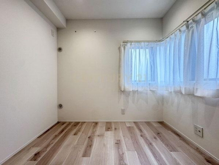 �����s���c�J��{��3���� 38-4�̒��Ã}���V�����̎q������