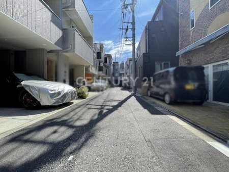 �����s�i���`��6���ڂ̒��È�ˌ��Ă̑O�ʓ��H�܂ތ��n�ʐ^