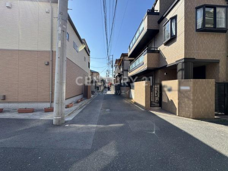 �����s�i��擌����2���ڂ̒��È�ˌ��Ă̑O�ʓ��H�܂ތ��n�ʐ^