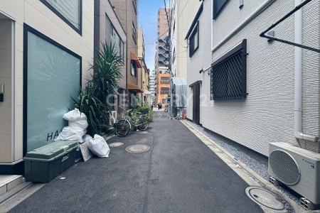 �����s�䓌�旋��1���ڂ̓y�n�̑O�ʓ��H�܂ތ��n�ʐ^