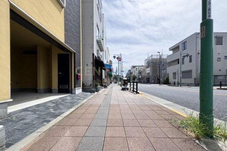 �����s��c���r��5���ڂ̒��È�ˌ��Ă̑O�ʓ��H�܂ތ��n�ʐ^