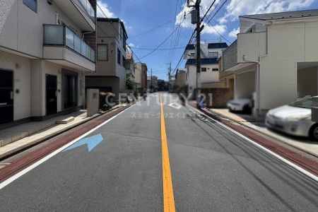 �����s��c���n��4���ڂ̒��È�ˌ��Ă̑O�ʓ��H�܂ތ��n�ʐ^